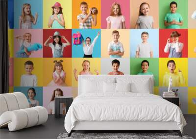 Big collage of adorable children on color background Wall mural