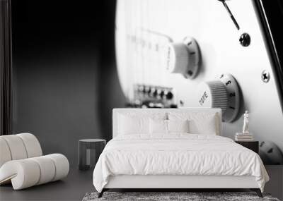 Black and white photo of modern bass guitar, closeup Wall mural