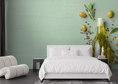 Bottle with tasty olive oil on wooden table Wall mural