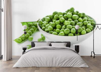 Bowl with green peas on white background Wall mural