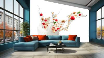 Bowl with splashing milk, sweet oatmeal, falling raspberries and nuts on white background Wall mural