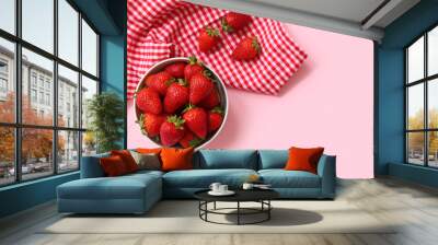 Bowl with sweet fresh strawberries on pink background Wall mural