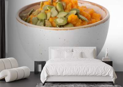 Bowl with tasty carrot hummus on white background Wall mural