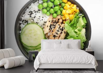 Bowl with tasty rice, chicken and vegetables on white background Wall mural