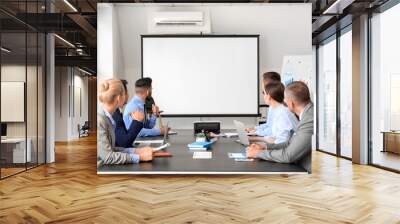 Business people having meeting in office Wall mural