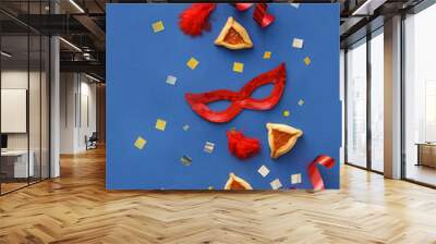 Carnival mask and Hamantaschen cookies for Purim holiday on color background Wall mural