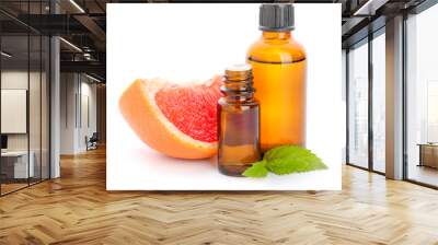 Citrus essential oil on white background Wall mural