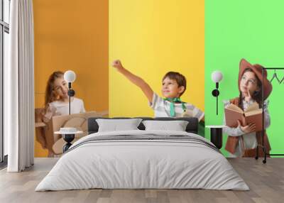 Collage of active little children on color background Wall mural