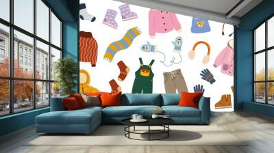 Collage of stylish winter clothes and accessories for children on white background Wall mural