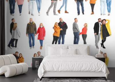 Collage with couples in casual clothes walking on white background Wall mural