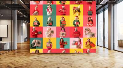 Collage with happy people holding Christmas gifts on color background Wall mural