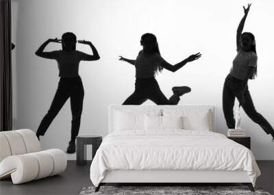 Collection of female hip-hop dancer's silhouettes on white background Wall mural