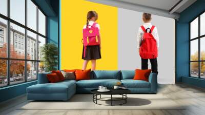 Collection of little school children with backpacks on color background, top view Wall mural