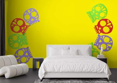 Colorful paper skulls on yellow background. Celebration of Mexico's Day of the Dead (El Dia de Muertos) Wall mural