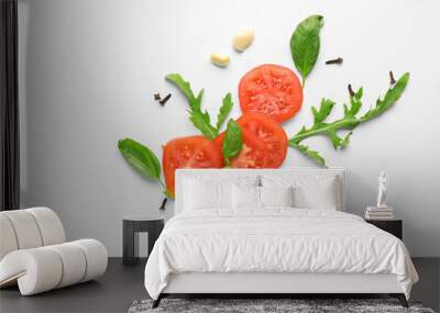 Composition with basil, tomatoes and spices on white background Wall mural