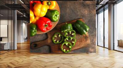 Composition with fresh bell peppers on table Wall mural