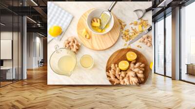 Composition with ingredients for healthy ginger juice on table Wall mural