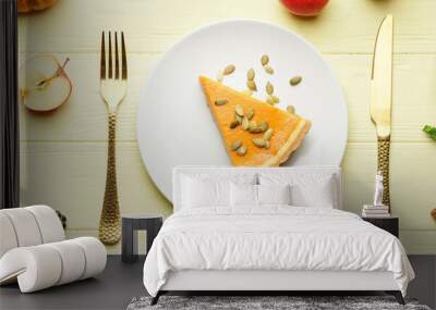 Composition with slice of tasty pumpkin pie on wooden background Wall mural