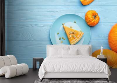 Composition with tasty cut pumpkin pie on wooden background Wall mural