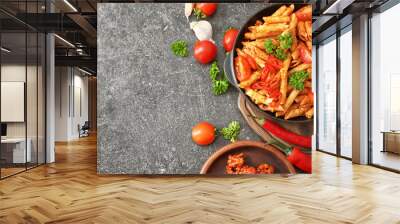 Composition with tasty penne pasta on grey background Wall mural