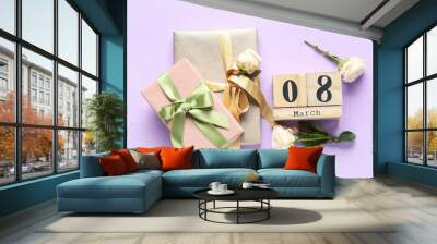 Cube calendar with date 8 MARCH, gift boxes and beautiful roses on lilac background. International Women's Day Wall mural