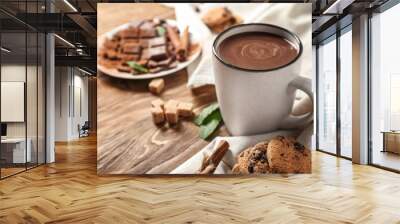 Cup of hot chocolate on wooden table Wall mural