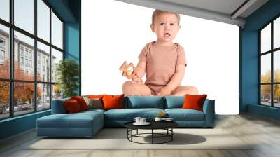 Cute baby with toy on white background Wall mural