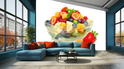 Delicious fruit salad in glass bowl on white background Wall mural