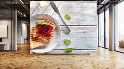 Delicious toasts with sweet jam on plate Wall mural