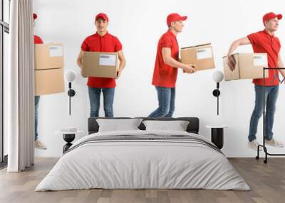 Delivery man with boxes on white background Wall mural