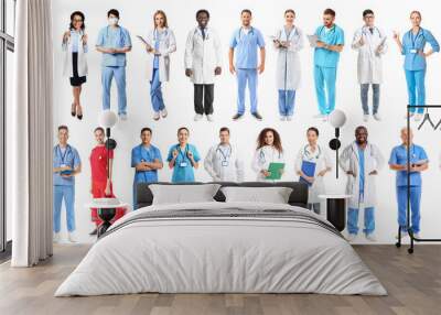 Different doctors and nurses on white background Wall mural