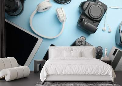 Different modern devices on color background Wall mural