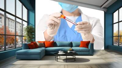 Doctor with blood sample on white background. Concept of Coronavirus epidemic Wall mural