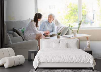 Doctor with senior woman in nursing home Wall mural