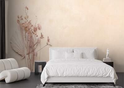 Dried flowers and leaf on light background Wall mural