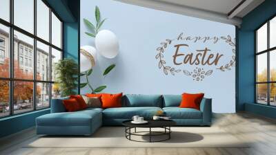 Eggs and text HAPPY EASTER on light background Wall mural