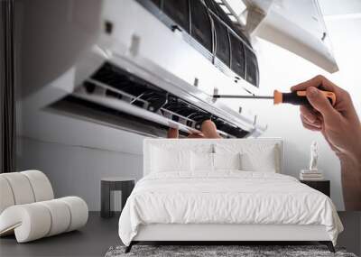 Electrician repairing air conditioner indoors Wall mural