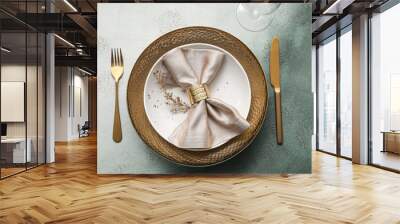 Elegant table setting with golden leaves and cutlery on grey table Wall mural