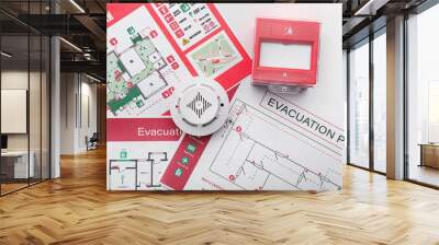 Evacuation plans, smoke detector and manual call point on white background Wall mural