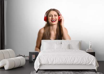 Female dj playing music on white background Wall mural