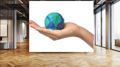 Female hand with model of Earth on white background Wall mural