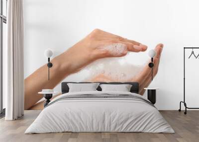 Female hands with soap foam on white background Wall mural