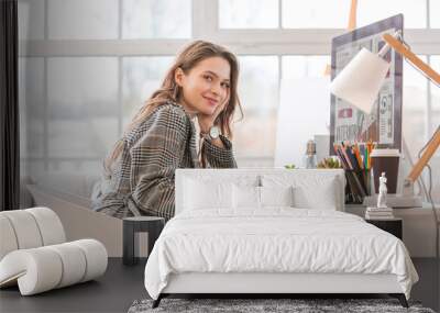 Female interior designer working in office Wall mural