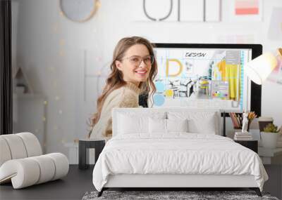 Female interior designer working in office Wall mural