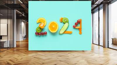 Figure 2024 made of fresh fruits and vegetables on color background Wall mural