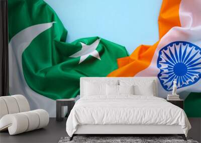 Flags of India and Pakistan on blue background Wall mural