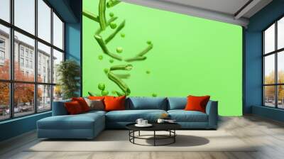 Flying green beans and peas on color background Wall mural