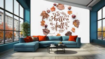 Frame made of autumn leaves on white background Wall mural