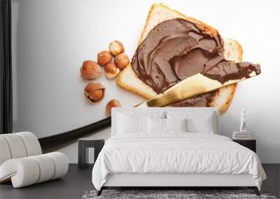 Fresh bread with chocolate paste on white background Wall mural