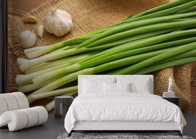 Fresh green onion on table Wall mural